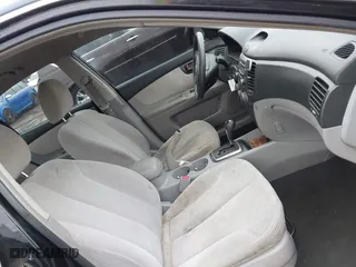 2007 Kia Optima LX with VIN KNAGE123175133499, listed as a IAAI auction lot 41958955 with 132,480 mi miles. Bid and sale history available at carsss.com. Image 5.