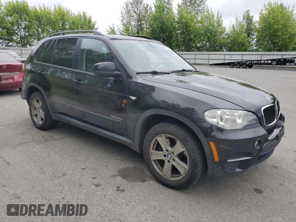 2012 BMW X5 35d with VIN 5UXZW0C54CL671377, listed as a Copart auction lot 60936395 with 105,903 mi miles and Salvage title. Bid and sale history available at DreamBid. Image 4.