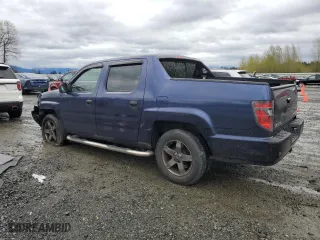 2013 Honda Ridgeline RT with VIN 5FPYK1F23DB002979, listed as a Copart auction lot 52128235 with 70,125 mi miles and Salvage Title. Bid and sale history available at carsss.com. Image 2.