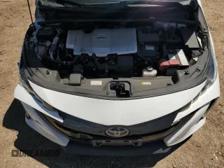 2022 Toyota Prius LE z VIN JTDKAMFP8N3197278, wystawiony jako Copart lot #55828765 z przebiegiem 122 709 mil mil oraz Szkoda całkowita • Salvage title. Historia ofert i sprzedaży dostępna na DreamBid. Obrazek 11.