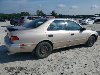 2001 Toyota Camry CE z VIN 4T1BG22KX1U774132, wystawiony jako Copart lot #57632885 z przebiegiem 179 771 mil mil oraz Szkoda całkowita • Salvage title. Historia ofert i sprzedaży dostępna na DreamBid. Obrazek 3.