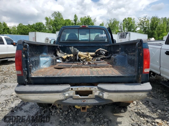 1999 Ford F-250 XL with VIN 1FTNF21FXXEB26561, listed as a Copart auction lot 54303275 with 219,108 mi miles and Salvage title. Bid and sale history available at DreamBid. Image 6.