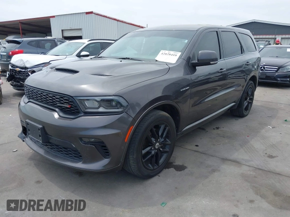 2021 Dodge Durango R/T with VIN 1C4SDJCT1MC820407, listed as a IAAI auction lot 42028410 with 75,435 mi miles and . Bid and sale history available at DreamBid. Image 23.