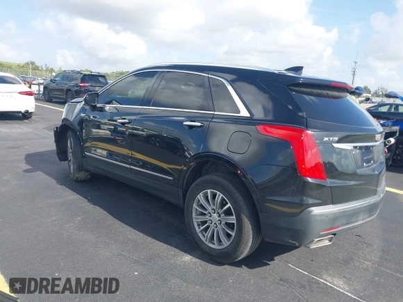 2017 Cadillac XT5 Luxury FWD with VIN 1GYKNBRS5HZ106391, listed as a IAAI auction lot 42494351 with 67,445 mi miles and . Bid and sale history available at DreamBid. Image 3.