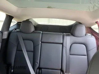 2025 Tesla Model Y Long Range z VIN 7SAYGDEE4SF260712, wystawiony jako Copart lot #54208975 z przebiegiem 1054 mil mil oraz Szkoda całkowita • Salvage title. Historia ofert i sprzedaży dostępna na DreamBid. Obrazek 10.