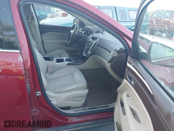 2011 Cadillac SRX Luxury Collection z VIN 3GYFNAEY2BS517192, wystawiony jako IAAI lot #42494074 z przebiegiem 191 094 mil mil oraz . Historia ofert i sprzedaży dostępna na DreamBid. Obrazek 5.