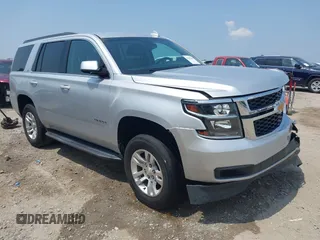 2019 Chevrolet Tahoe LT with VIN 1GNSKBKC8KR363433, listed as a IAAI auction lot 42567045 with 122,956 mi miles and . Bid and sale history available at DreamBid. Image 1.