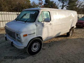 1992 GMC Vandura z VIN 2GTGG39KXN4515226, wystawiony jako Copart lot #85211254 z przebiegiem 594 809 mil mil oraz Szkody całkowita. Historia ofert i sprzedaży dostępna na DreamBid. Obrazek 1.
