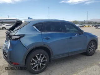 2018 Mazda CX-5 Grand Touring with VIN JM3KFBDM3J0323211, listed as a Copart auction lot 61166735 with Not provided miles and Salvage title. Bid and sale history available at DreamBid. Image 3.