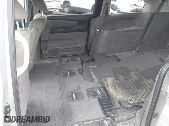 2011 Honda Odyssey LX with VIN 5FNRL5H25BB040287, listed as a IAAI auction lot 42456679 with 129,176 mi miles and . Bid and sale history available at DreamBid. Image 8.