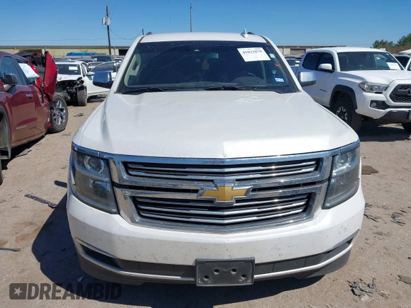 2016 Chevrolet Tahoe LTZ with VIN 1GNSCCKC1GR404754, listed as a IAAI auction lot 41831879 with 139,681 mi miles and . Bid and sale history available at DreamBid. Image 12.