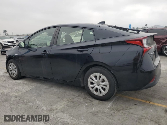 2021 Toyota Prius L Eco z VIN JTDKAMFU2M3148890, wystawiony jako Copart lot #60064065 z przebiegiem 58 226 mil mil oraz Szkoda całkowita • Salvage title. Historia ofert i sprzedaży dostępna na DreamBid. Obrazek 2.