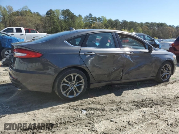 2020 Ford Fusion SEL z VIN 3FA6P0CD7LR196193, wystawiony jako Copart lot #53254465 z przebiegiem 79 944 mil mil oraz Szkoda całkowita • Salvage title. Historia ofert i sprzedaży dostępna na DreamBid. Obrazek 3.
