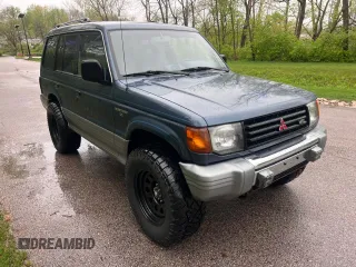 1993 Mitsubishi Montero z VIN JA4MR41H8PJ006775, wystawiony jako Copart lot #54094495 z przebiegiem 93 337 mil mil oraz Czysty tytuł • Clean title. Historia ofert i sprzedaży dostępna na DreamBid. Obrazek 1.