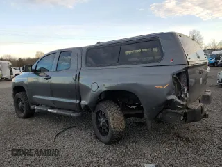 2015 Toyota Tundra 4WD Truck SR with VIN 5TFUM5F15FX063047, listed as a Copart auction lot 87409124 with 122,877 mi miles and Salvage Title. Bid and sale history available at carsss.com. Image 2.