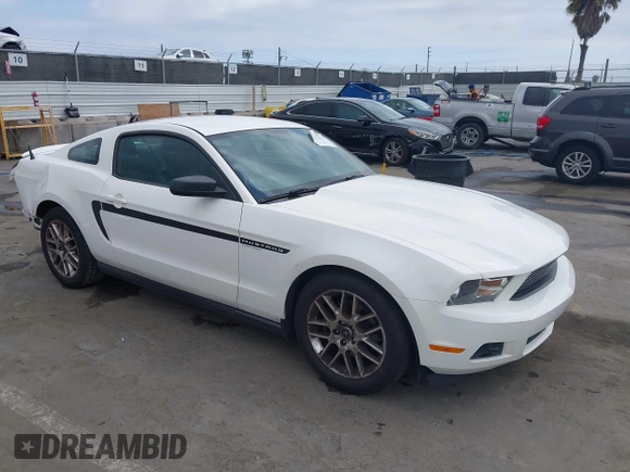 2012 Ford Mustang Premium with VIN 1ZVBP8AM6C5234877, listed as a IAAI auction lot 41911274 with 119,512 mi miles and . Bid and sale history available at DreamBid. Image 1.