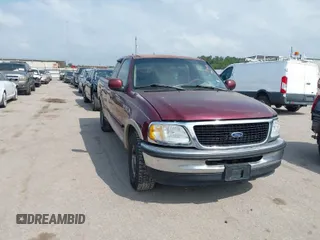 1997 Ford F-150 z VIN 1FTDX17W1VNB67040, wystawiony jako IAAI lot #41940240 z przebiegiem 99 816 mil mil oraz . Historia ofert i sprzedaży dostępna na DreamBid. Obrazek 1.