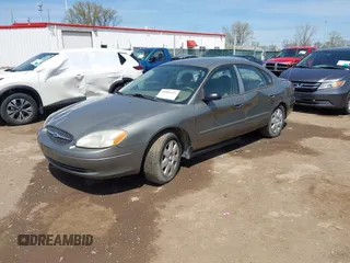2003 Ford Taurus LX Standard with VIN 1FAFP52U63A235154, listed as a IAAI auction lot 42084426 with 162,497 mi miles and . Bid and sale history available at DreamBid. Image 2.