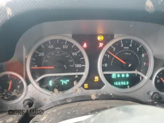 2007 Jeep Wrangler Unlimited Rubicon with VIN 1J4GA69117L112867, listed as a Copart auction lot 59909565 with 166,963 mi miles and Salvage title. Bid and sale history available at DreamBid. Image 9.