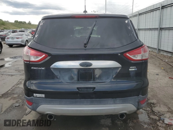 2013 Ford Escape SEL with VIN 1FMCU9H94DUB99234, listed as a Copart auction lot 60330965 with 151,933 mi miles and Salvage title. Bid and sale history available at DreamBid. Image 6.