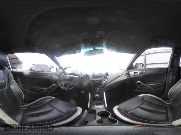 2013 Hyundai Veloster Turbo z VIN KMHTC6AE2DU128607, wystawiony jako IAAI lot #41788836 z przebiegiem 115 500 mil mil oraz . Historia ofert i sprzedaży dostępna na DreamBid. Obrazek 19.