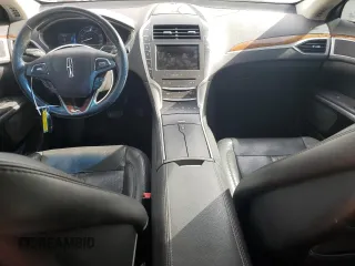 2014 Lincoln MKZ Hybrid with VIN 3LN6L2LU9ER808684, listed as a Copart auction lot 52974105 with 123,486 mi miles and Salvage Title. Bid and sale history available at DreamBid. Image 8.