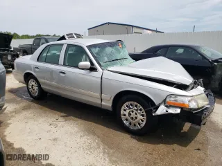 2003 Mercury Grand Marquis GS Convenience with VIN 2MEFM74W13X671414, listed as a Copart auction lot 63143394 with 129,629 mi miles and Non Repairable. Bid and sale history available at carsss.com. Image 4.