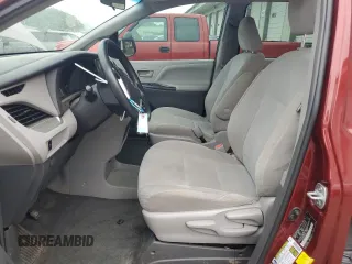 2015 Toyota Sienna L with VIN 5TDZK3DC5FS634370, listed as a Copart auction lot 63488005 with 115,815 mi miles and Salvage title. Bid and sale history available at DreamBid. Image 7.