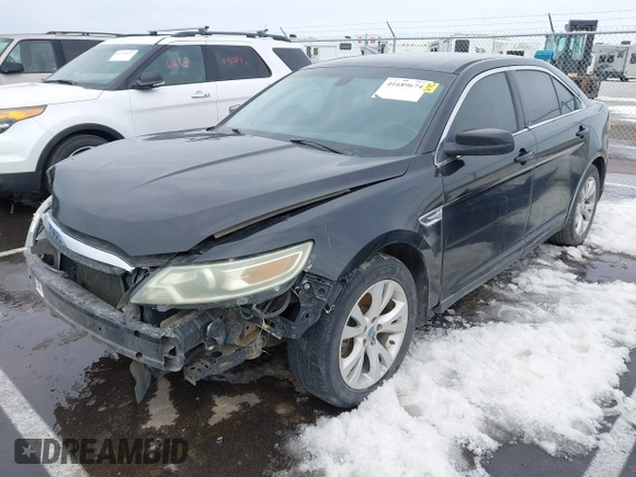 2011 Ford Taurus SEL with VIN 1FAHP2EW1BG114726, listed as a IAAI auction lot 41689674 with 312,338 mi miles. Bid and sale history available at carsss.com. Image 2.