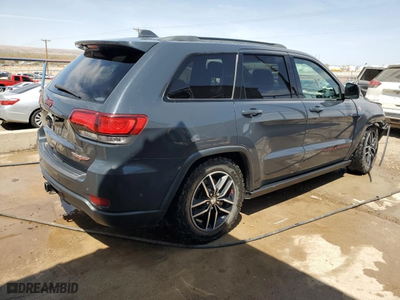 2018 Jeep Grand Cherokee Trailhawk with VIN 1C4RJFLT6JC328715, listed as a Copart auction lot 49987175 with 105,515 mi miles and Salvage Title. Bid and sale history available at carsss.com. Image 3.