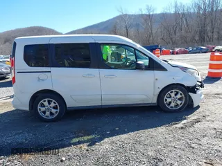 2014 Ford Transit Connect XLT z VIN NM0AE8F7XE1148356, wystawiony jako IAAI lot #41658732 z przebiegiem 128 180 mil mil oraz . Historia ofert i sprzedaży dostępna na DreamBid. Obrazek 13.