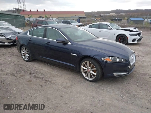 2015 Jaguar XF V6 Portfolio with VIN SAJWJ0FF5F8U67140, listed as a IAAI auction lot 41967522 with 68,000 mi miles. Bid and sale history available at carsss.com. Image 1.