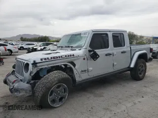 2023 Jeep Gladiator Rubicon with VIN 1C6JJTBG5PL571156, listed as a Copart auction lot 51385504 with 2,419 mi miles and Salvage Title. Bid and sale history available at carsss.com. Image 1.