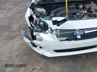 2019 Subaru Impreza Premium with VIN 4S3GTAC62K3704035, listed as a IAAI auction lot 42025822 with 76,067 mi miles and . Bid and sale history available at DreamBid. Image 6.