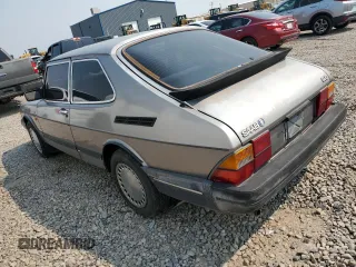 1987 Saab 900 z VIN YS3AR35J5H3010183, wystawiony jako Copart lot #70003404 z przebiegiem 138 740 mil mil oraz Czysty tytuł • Clean title. Historia ofert i sprzedaży dostępna na DreamBid. Obrazek 2.