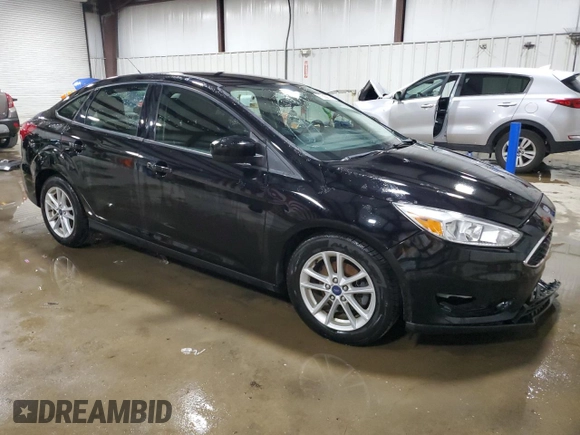 2018 Ford Focus SE with VIN 1FADP3FE4JL219907, listed as a Copart auction lot 50171475 with 65,965 mi miles and Clean title. Bid and sale history available at DreamBid. Image 4.