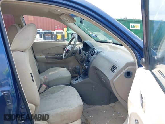 2006 Hyundai Tucson GL with VIN KM8JM12B66U342224, listed as a IAAI auction lot 42079428 with 196,248 mi miles. Bid and sale history available at carsss.com. Image 5.