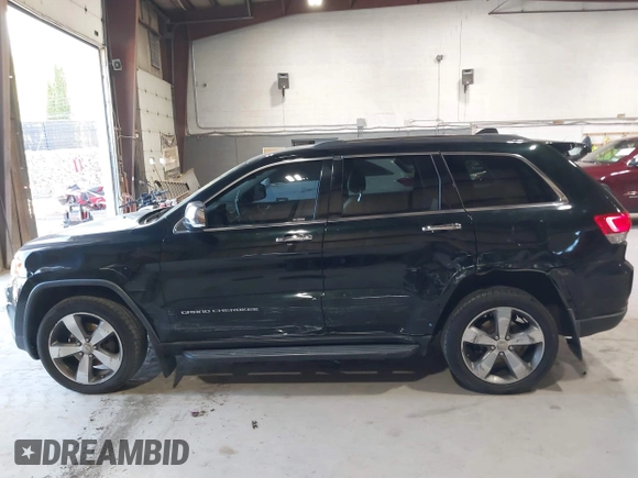 2014 Jeep Grand Cherokee Limited z VIN 1C4RJFBG2EC320282, wystawiony jako IAAI lot #42067273 z przebiegiem 78 061 mil mil oraz . Historia ofert i sprzedaży dostępna na DreamBid. Obrazek 14.