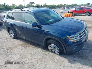 2018 Volkswagen Atlas SE z VIN 1V2CR2CA1JC561003, wystawiony jako IAAI lot #42556798 z przebiegiem 124 147 mil mil oraz . Historia ofert i sprzedaży dostępna na DreamBid. Obrazek 1.