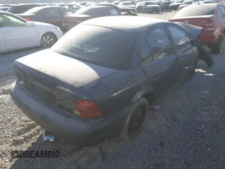 1999 Saturn SL with VIN 1G8ZH5289XZ336486, listed as a Copart auction lot 83240394 with Not Provided miles and Non Repairable. Bid and sale history available at carsss.com. Image 3.