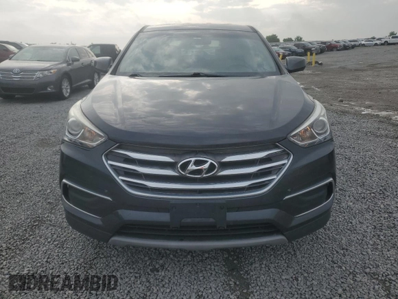 2018 Hyundai Santa Fe 2.4L with VIN 5XYZT3LB5JG561321, listed as a Copart auction lot 54839005 with 90,319 mi miles and Salvage title. Bid and sale history available at DreamBid. Image 5.