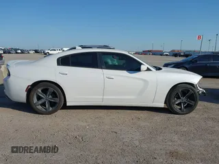 2015 Dodge Charger SXT with VIN 2C3CDXHG8FH730145, listed as a IAAI auction lot 42039927 with 156,135 mi miles and . Bid and sale history available at DreamBid. Image 14.