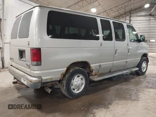 2007 Ford Econoline Passenger XL with VIN 1FBNE31L67DA26594, listed as a IAAI auction lot 41753476 with 154,709 mi miles. Bid and sale history available at carsss.com. Image 4.