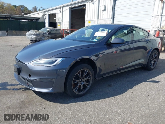 2021 Tesla Model S Plaid with VIN 5YJSA1E66MF456357, listed as a IAAI auction lot 42130286 with 48,010 mi miles. Bid and sale history available at carsss.com. Image 2.