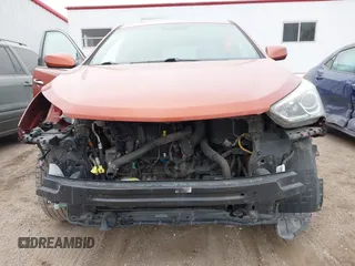 2017 Hyundai Santa Fe 2.4L z VIN 5XYZT3LB3HG498472, wystawiony jako IAAI lot #41483416 z przebiegiem 91 894 mil mil oraz . Historia ofert i sprzedaży dostępna na DreamBid. Obrazek 13.