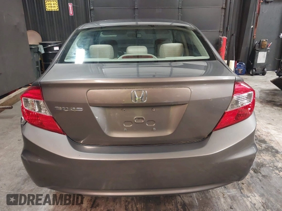 2012 Honda Civic LX z VIN 19XFB2F59CE373830, wystawiony jako IAAI lot #42312118 z przebiegiem 106 541 mil mil oraz . Historia ofert i sprzedaży dostępna na DreamBid. Obrazek 16.