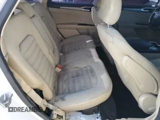 2016 Ford Fusion SE Hybrid с VIN 3FA6P0LU2GR360066, выставлен на аукционе Copart как лот 84767824 с пробегом 153 044 миль миль и Списание • Salvage title. История ставок и продаж доступна на DreamBid. Изображение 10.