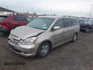 2005 Honda Odyssey EX with VIN 5FNRL38455B115547, listed as a IAAI auction lot 41911371 with 184,150 mi miles. Bid and sale history available at carsss.com. Image 2.
