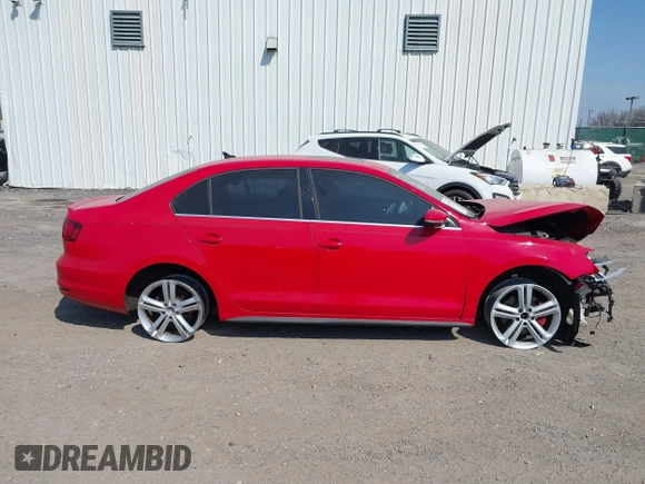 2015 Volkswagen Jetta Sedan 2.0T GLI SE with VIN 3VW5T7AJ2FM293898, listed as a IAAI auction lot 41753985 with 129,516 mi miles. Bid and sale history available at carsss.com. Image 14.