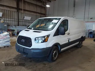 2015 Ford Transit Cargo with VIN 1FTNE1ZM8FKB17731, listed as a IAAI auction lot 42351353 with 74,489 mi miles and . Bid and sale history available at DreamBid. Image 2.